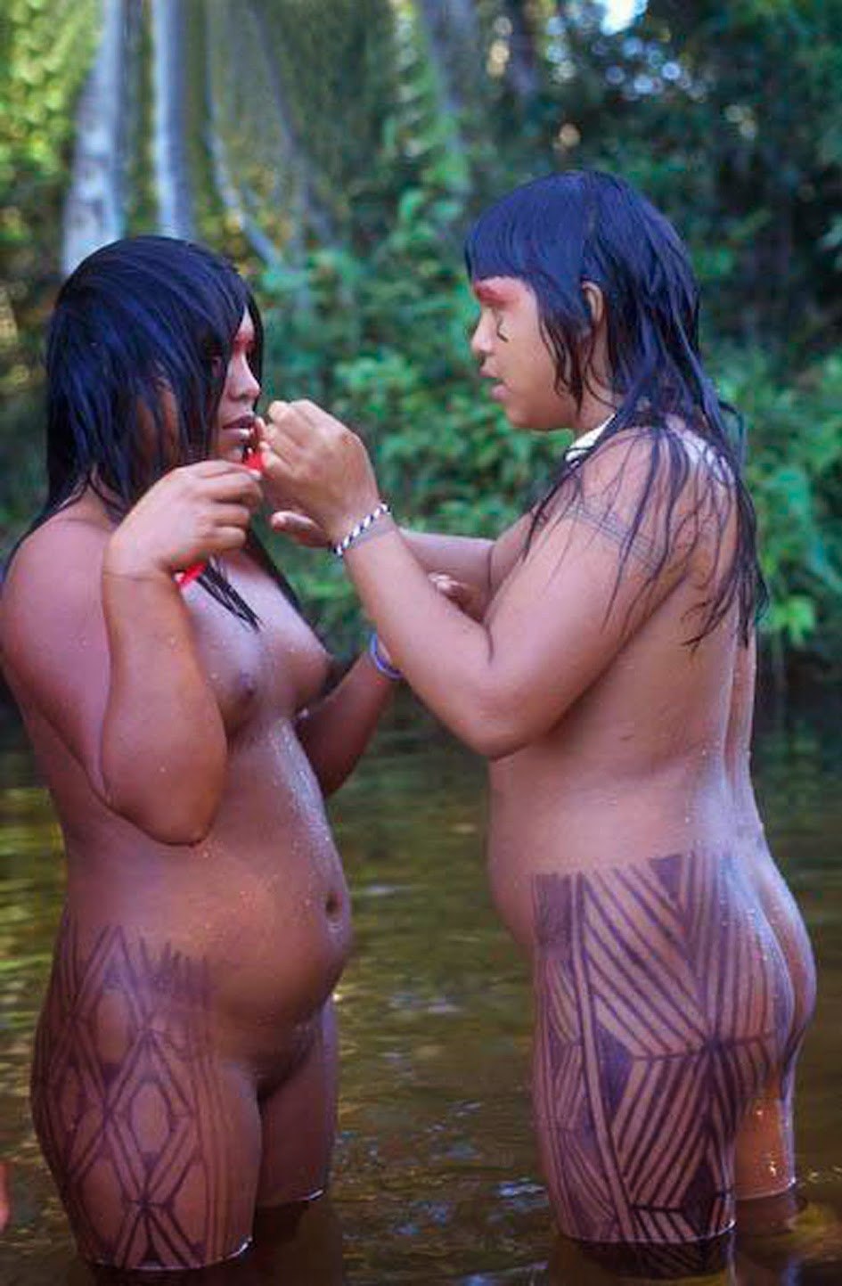 Naked Indians from the Xingu River Brazil