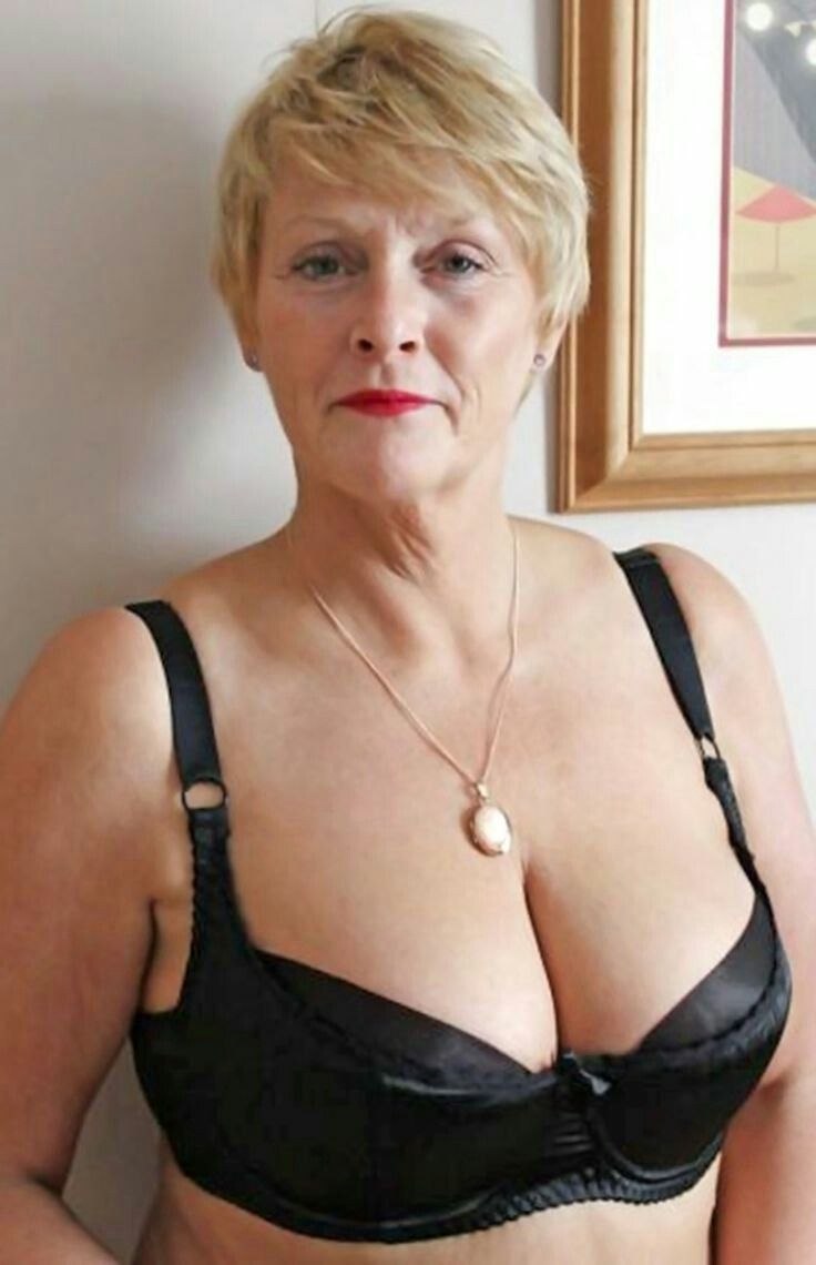 Older women with naked breasts