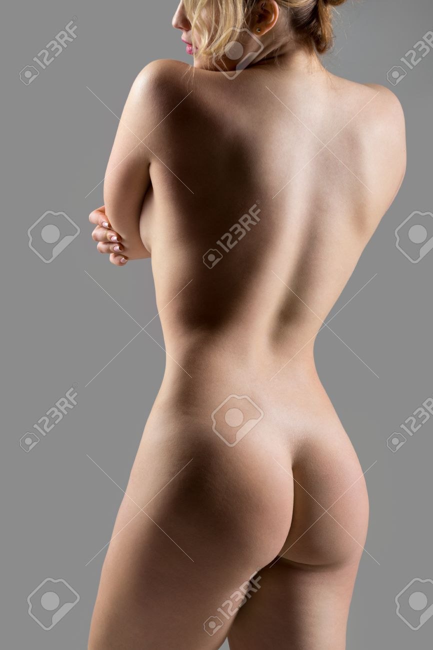 A crowd of naked women standing backwards