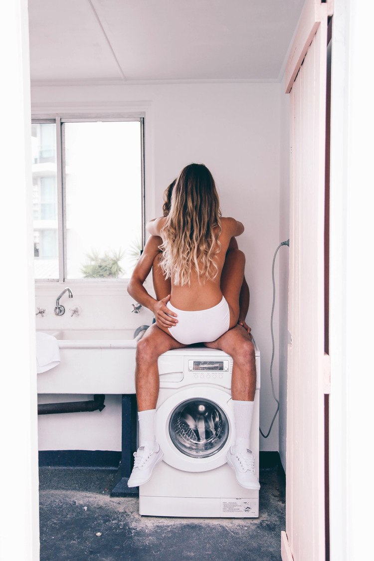 Naked on washing machine