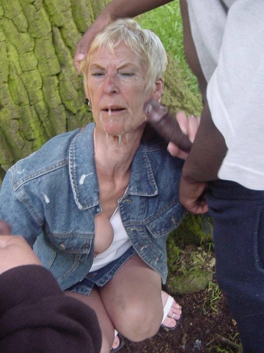 The old woman sucked on the street