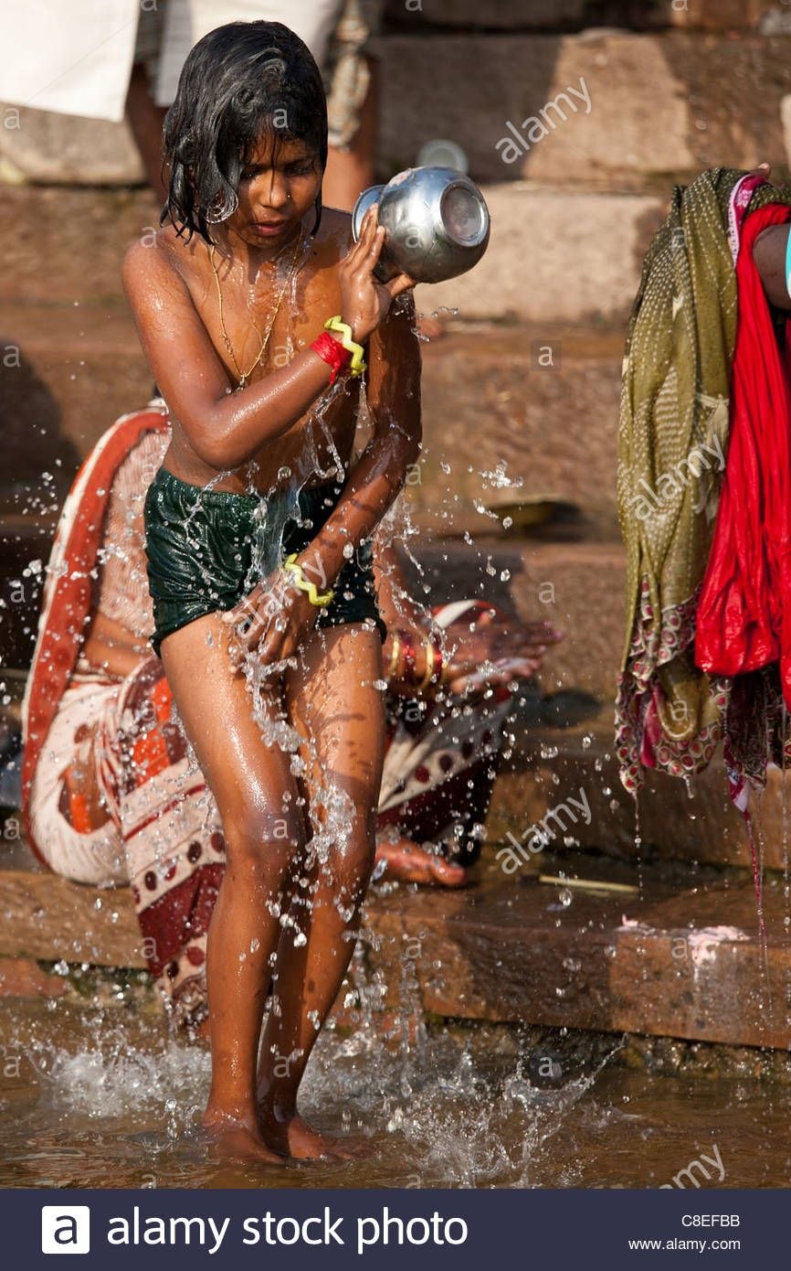 Teen Bathing River Varanashi