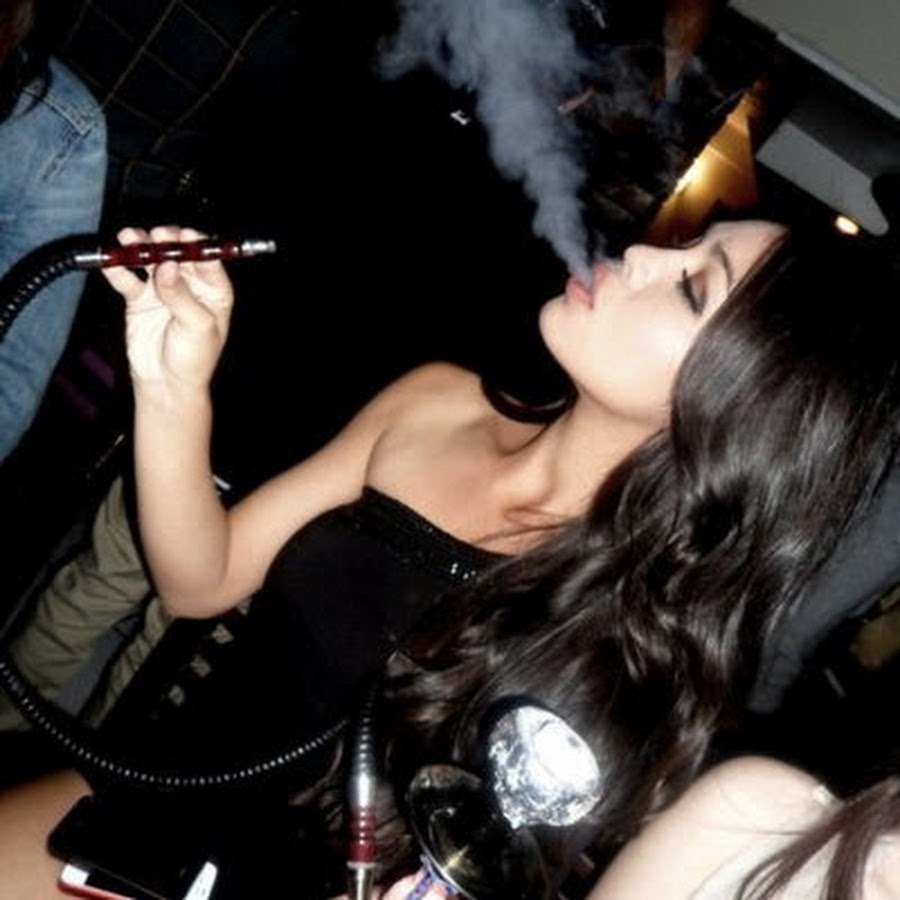 Girls smoke a hookah
