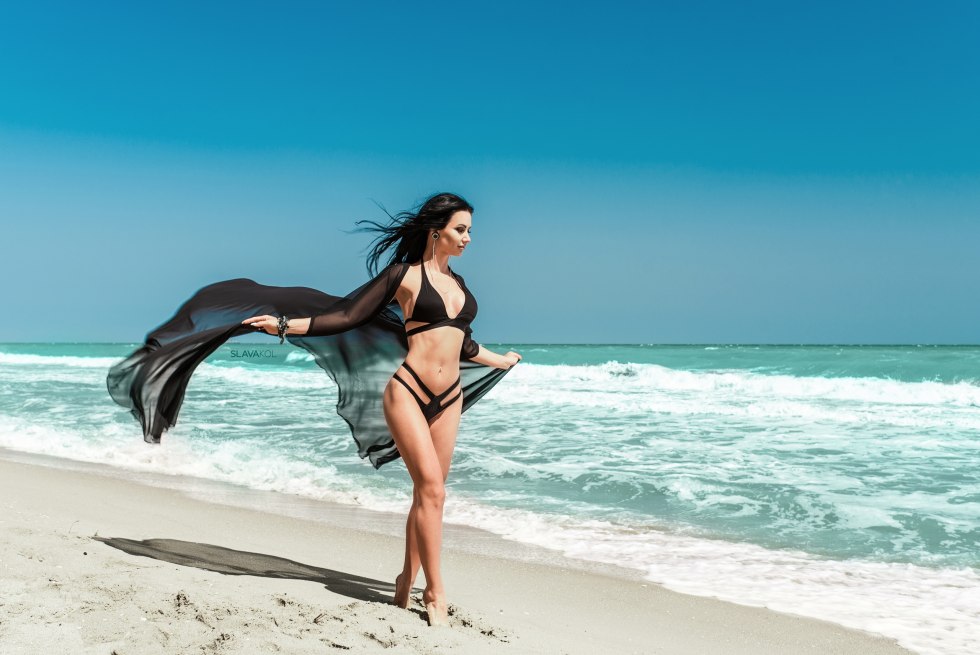 Ksenia Lukyancikova in a swimsuit at sea