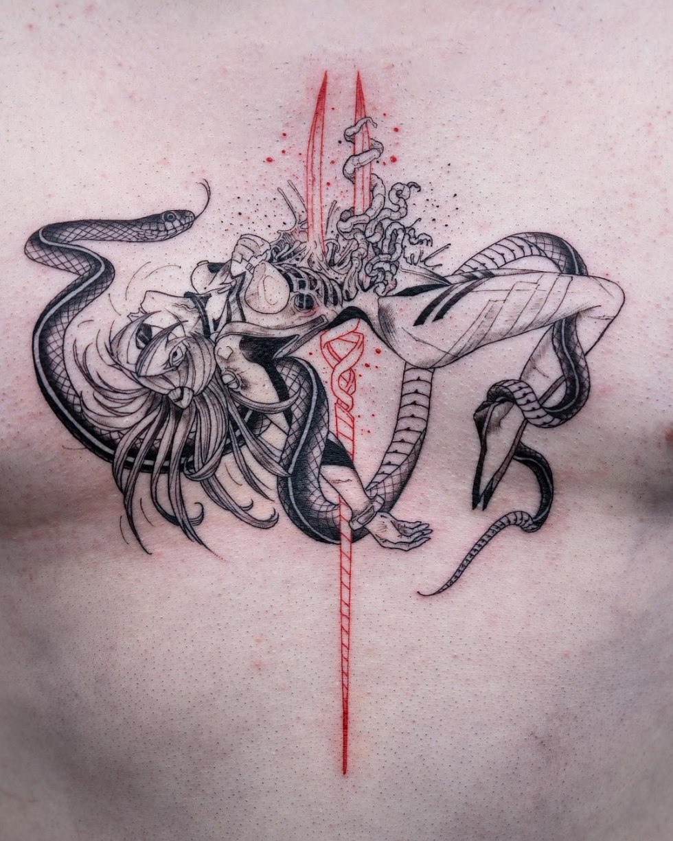 Snake tattoo on the hip