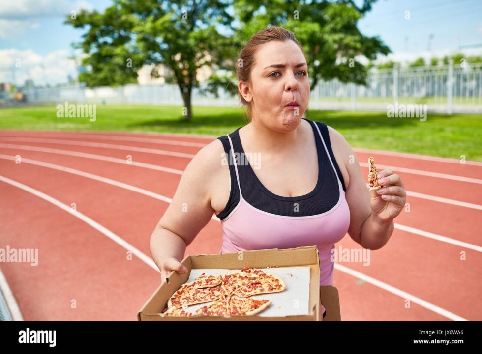 Woman lies eats grapes