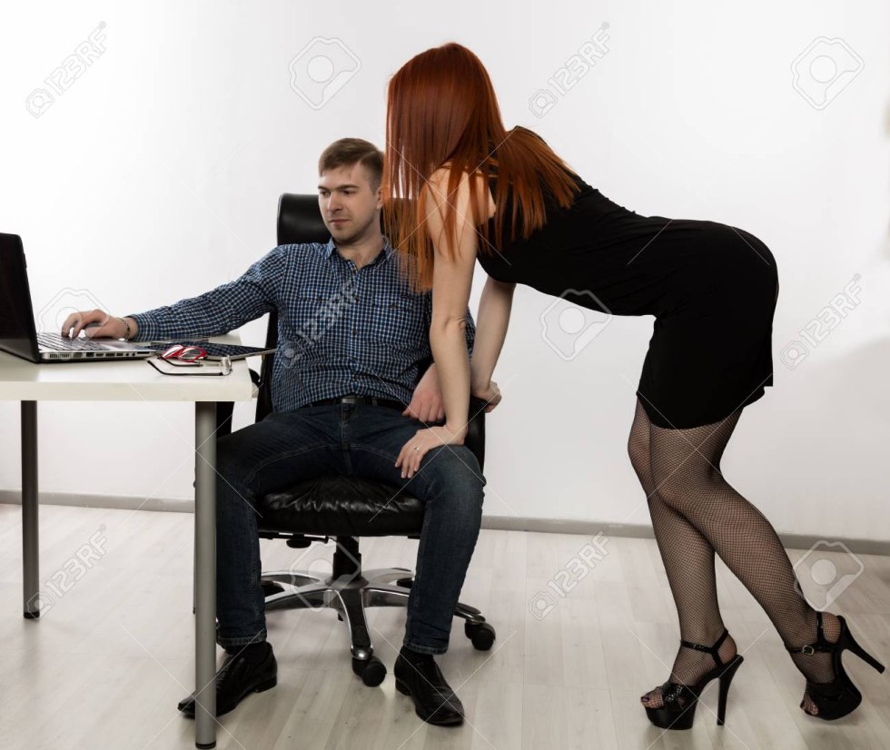 In the office, a girl on the knees