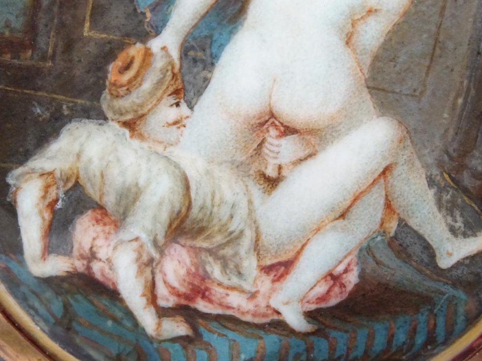 Naked women with slaves