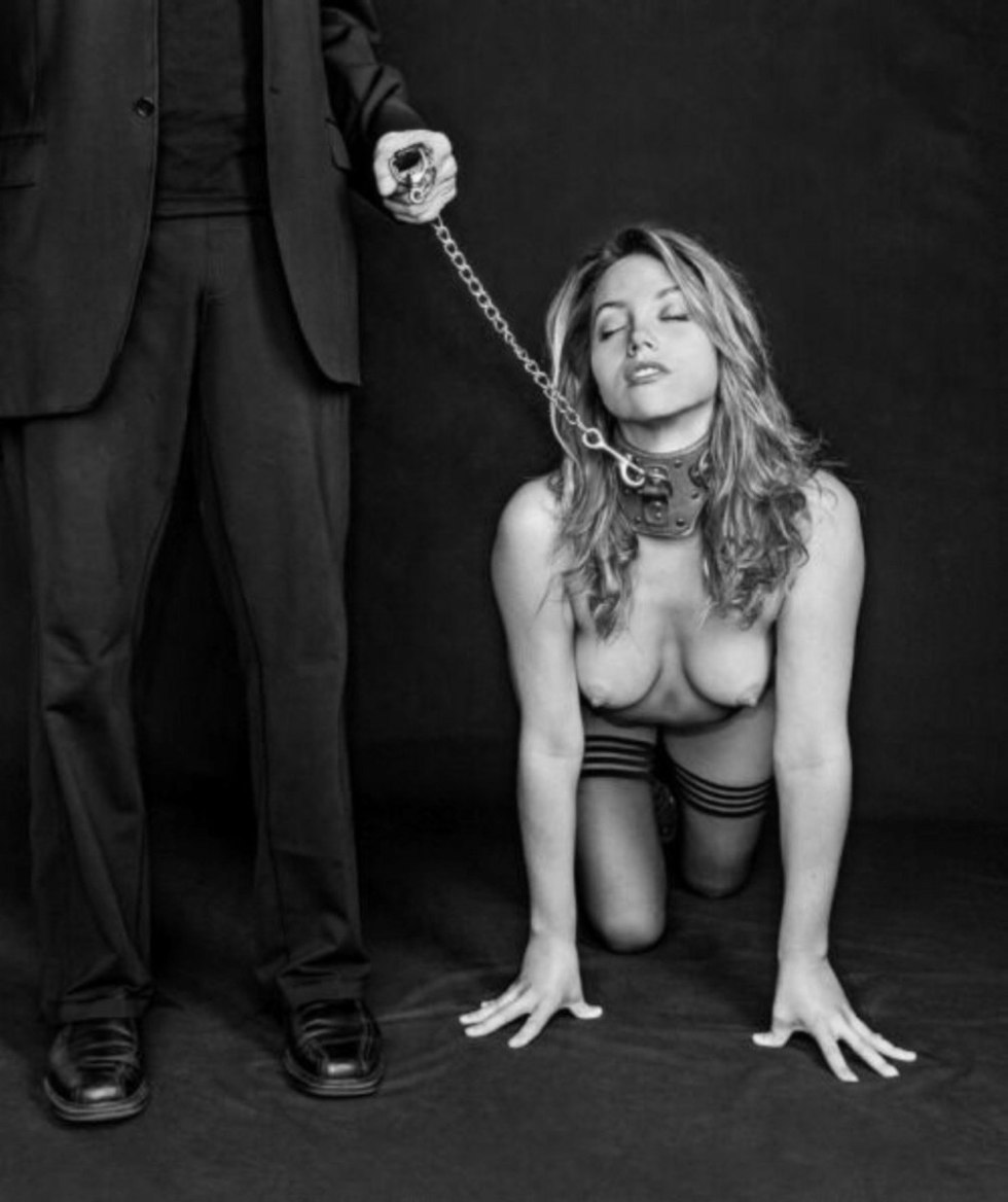 Naked slave on a leash