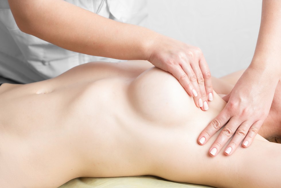 Lymphodrenal massage of a female breast