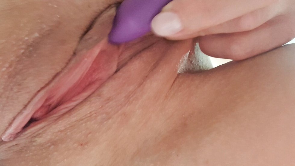 Girl caresses the clitoris