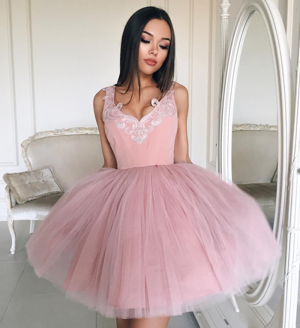 Hairstyle in the evening lush long dress