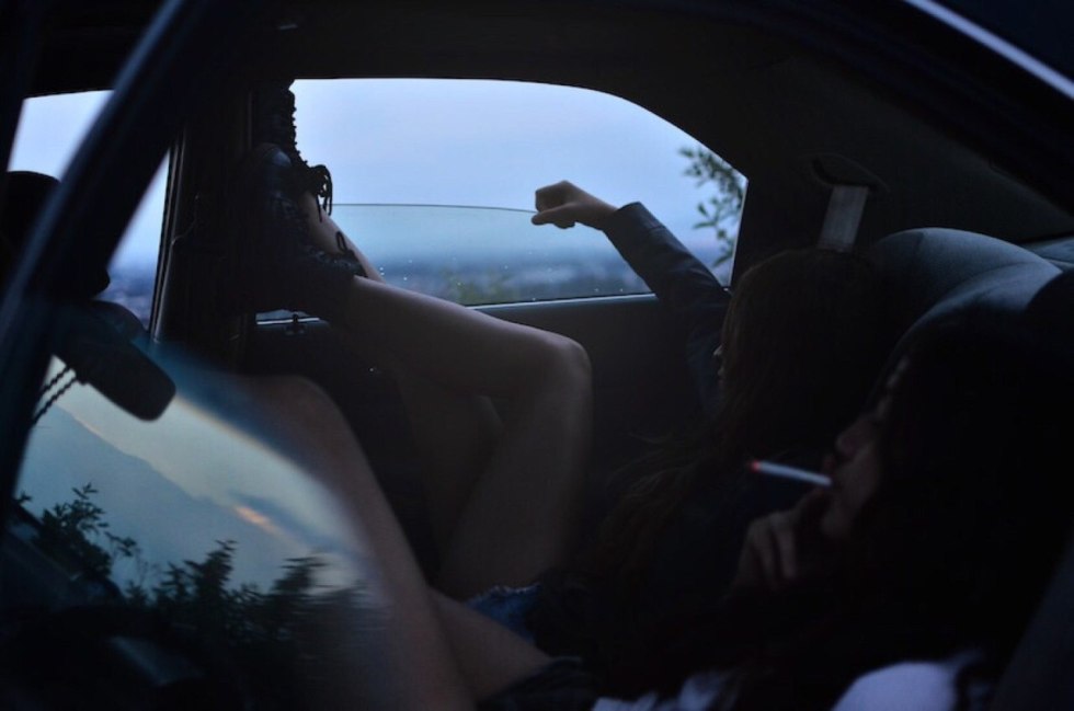 Girl in the car at night