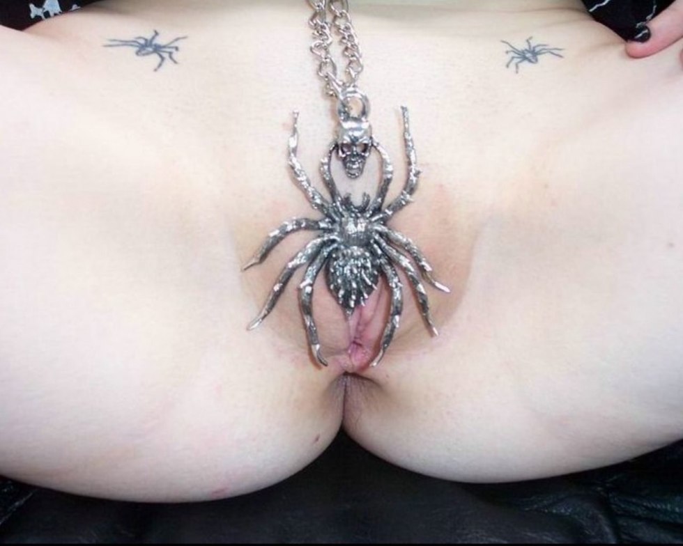 Piercing and tattoo on the vagina