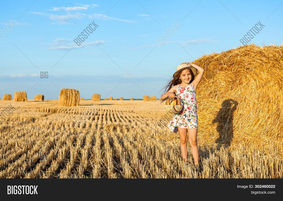 Photo shoot boy in a straw hat