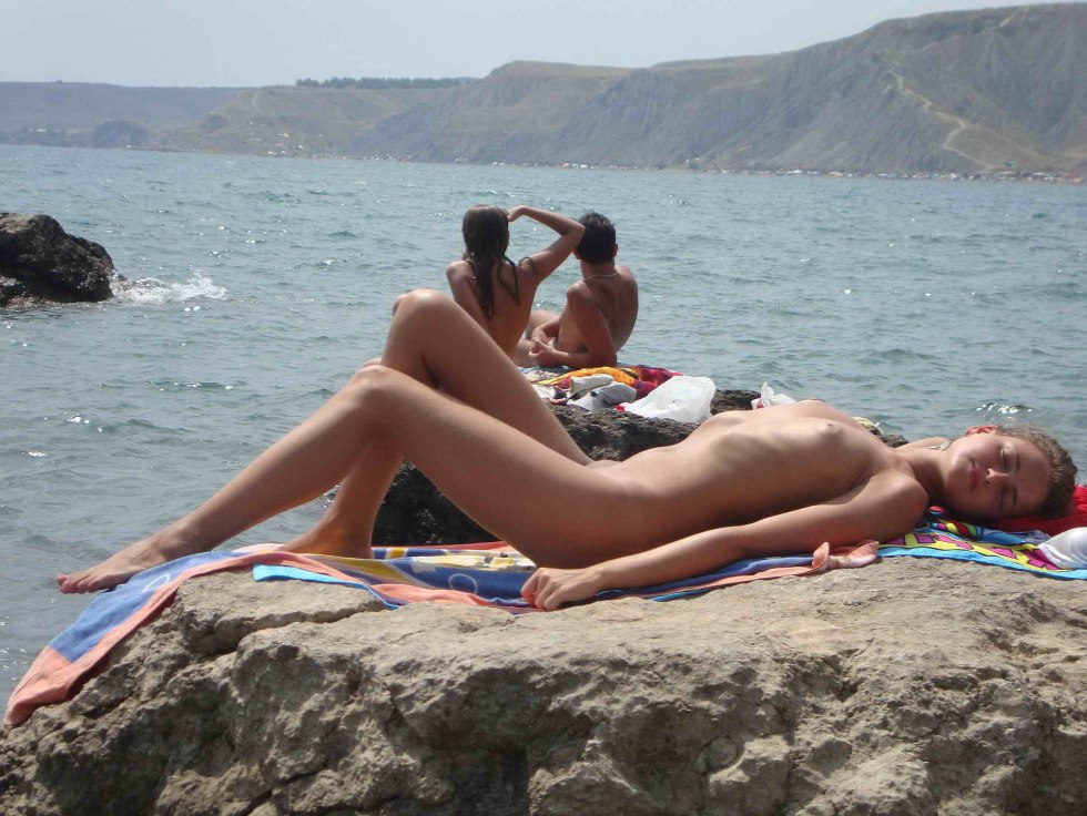 Skinny nudist on the beach