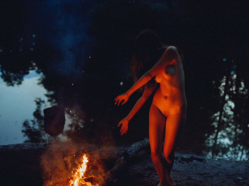 Girls naked by the fire