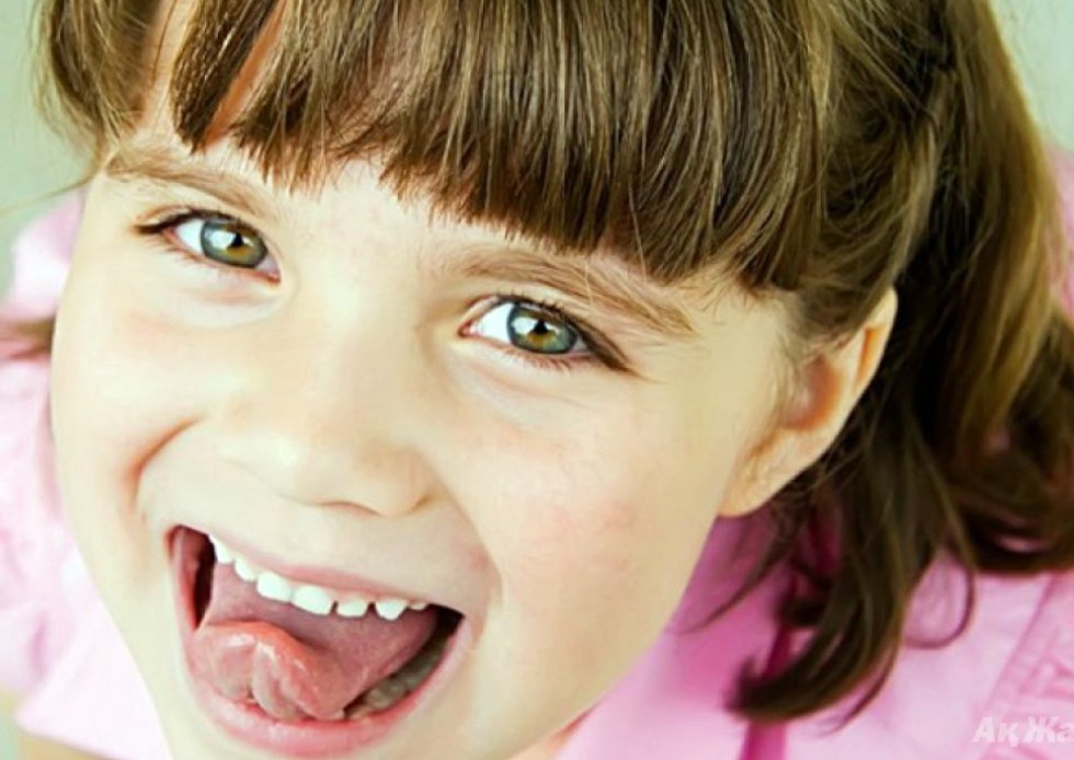 A child with a sticky tongue