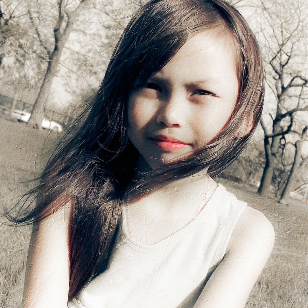 Katya Berger as a child