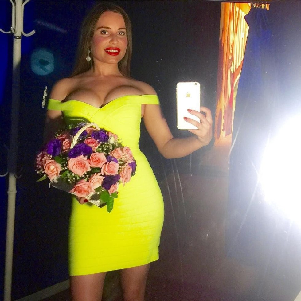 Julia Mikhalkova in a dress