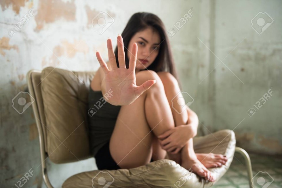 Female Prostitute Flirting Near the Client’s Car