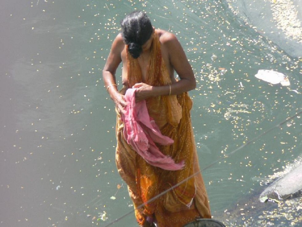 Indian Bathing in River