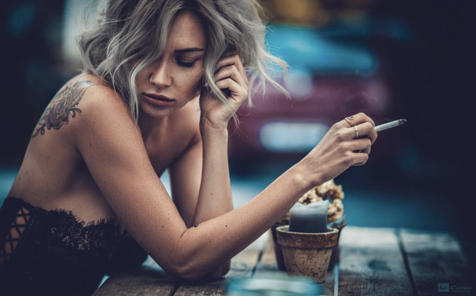 The girl smokes