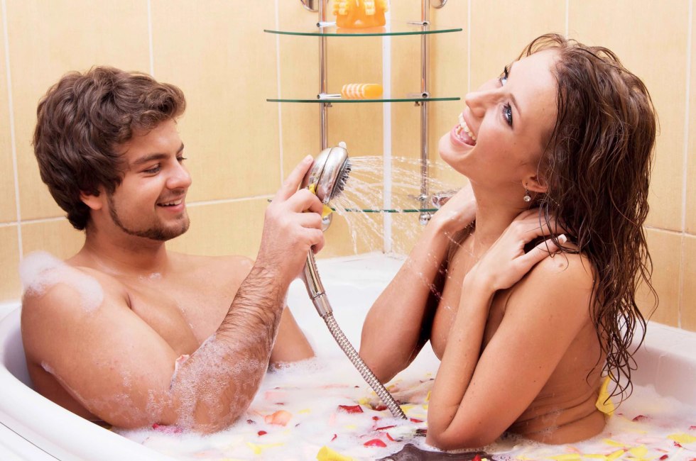 Girl and man in the bath
