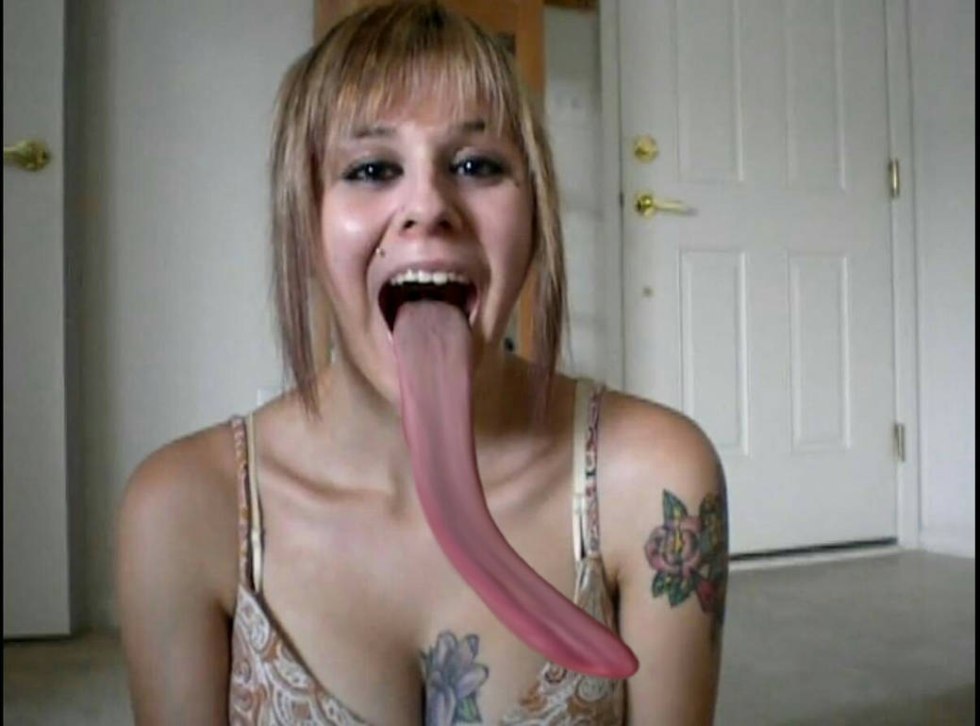 The girl opens her mouth close -up