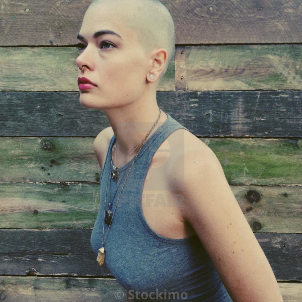 Girl with shaved head pink