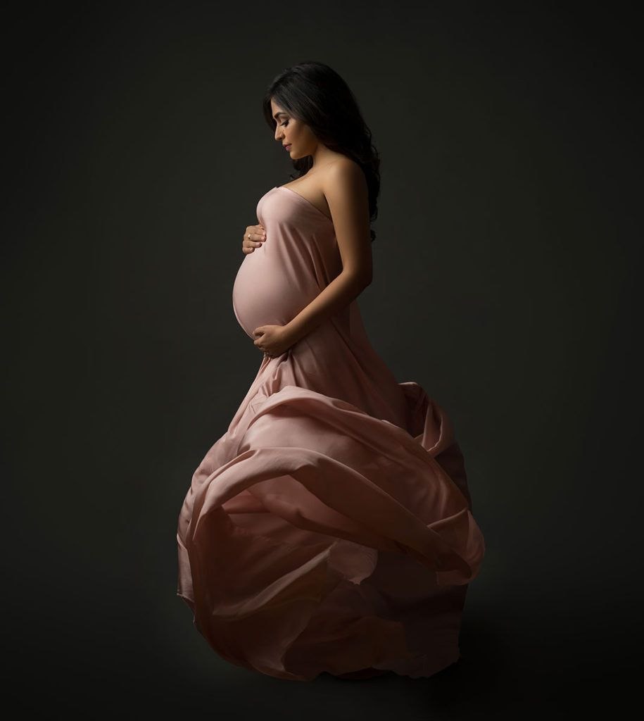 Beautiful pregnant women with a man