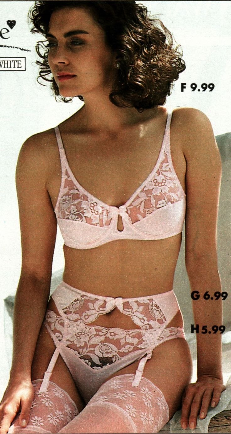 Margaret Nolan in stockings and belt