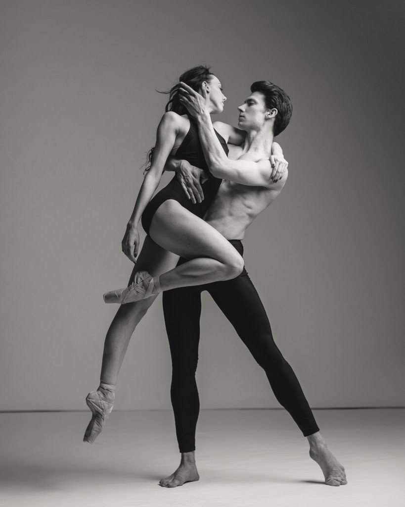 The woman sits sideways