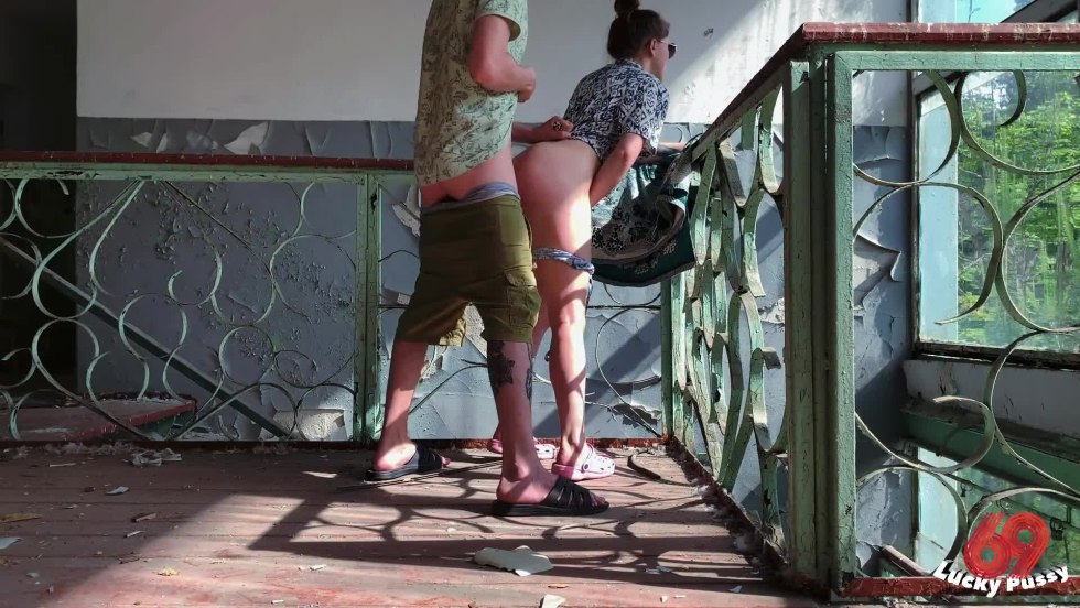 Naked in an abandoned building