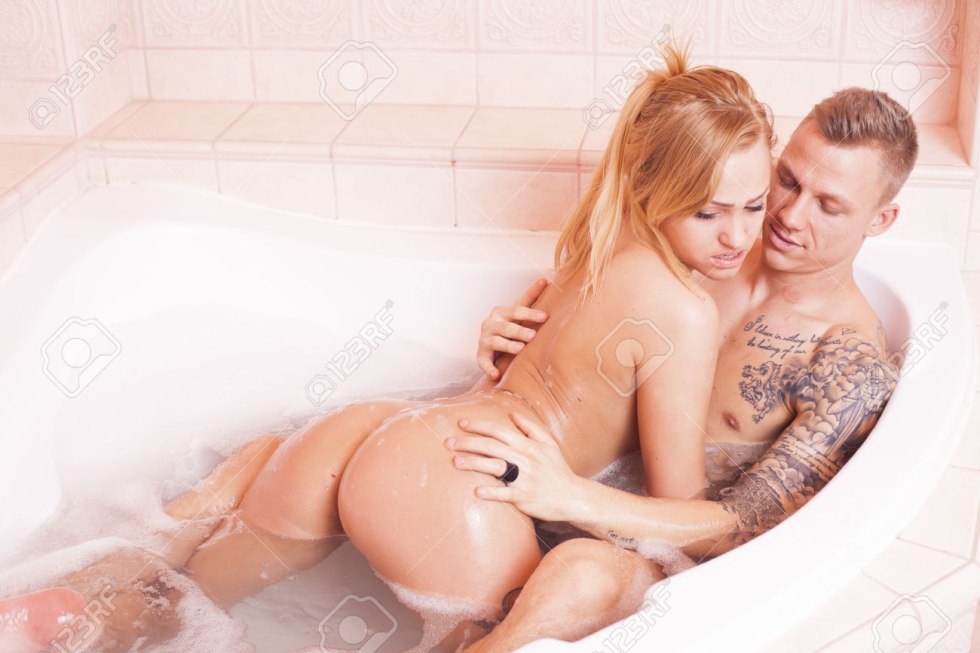 Naked young couples in the shower