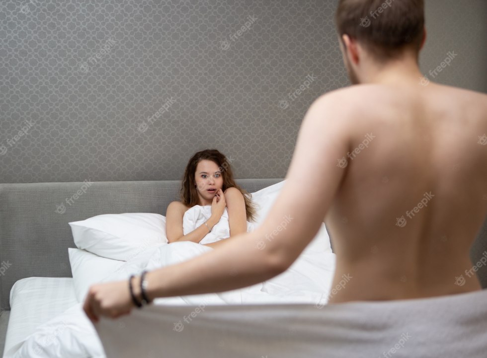 Women look at naked men