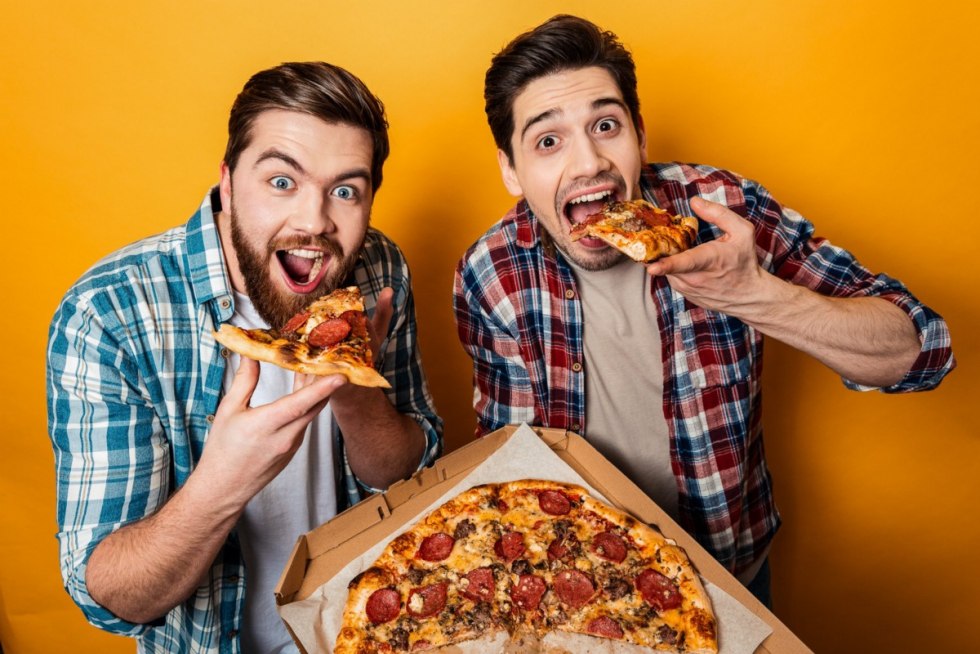 A guy with a pizza