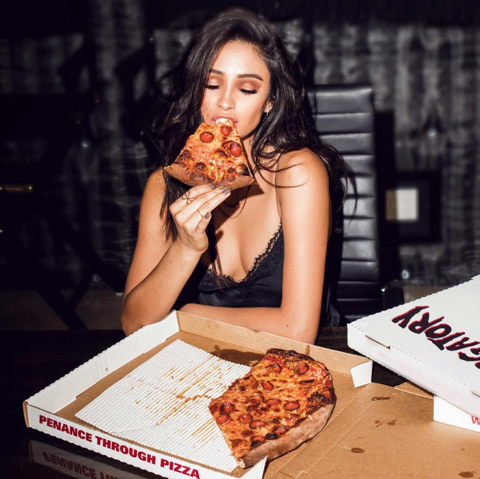 Beautiful girl with pizza