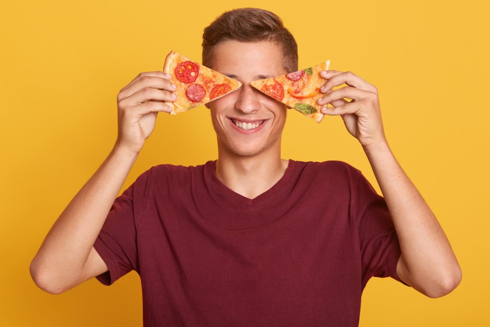 Pizza in his hands