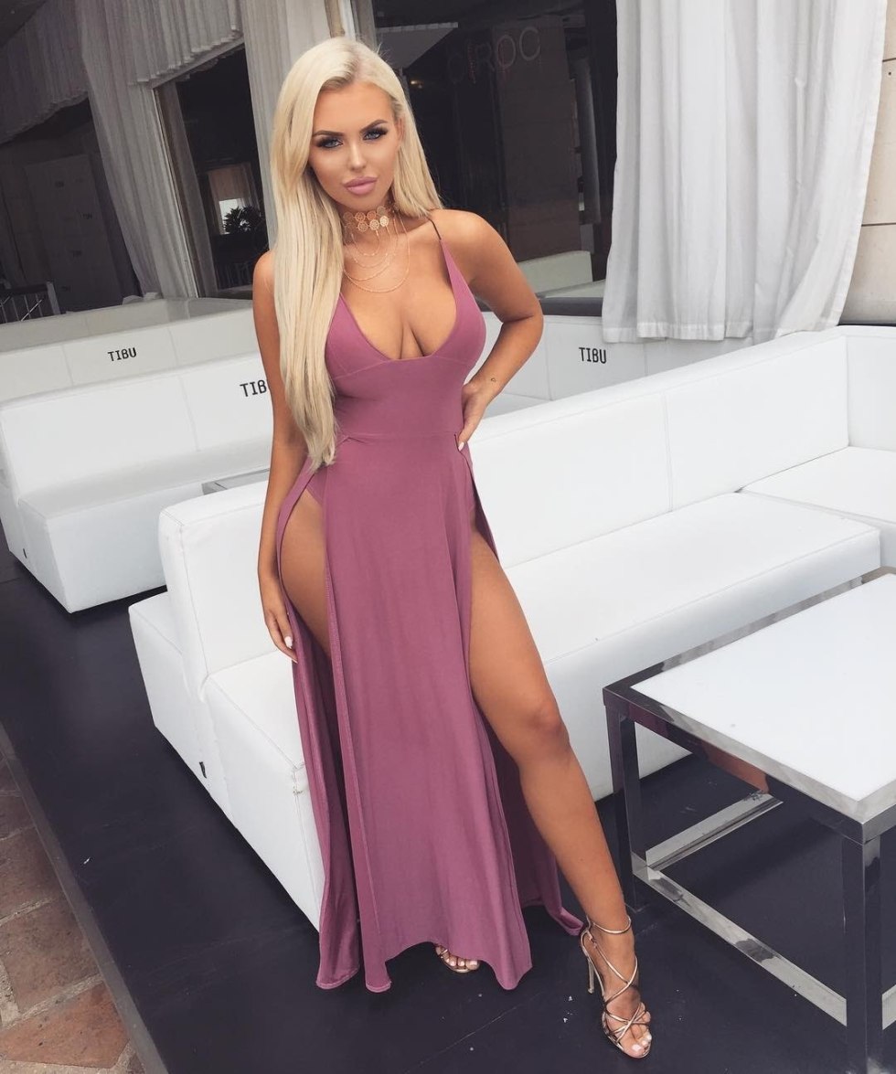 Blonde in a pink evening dress