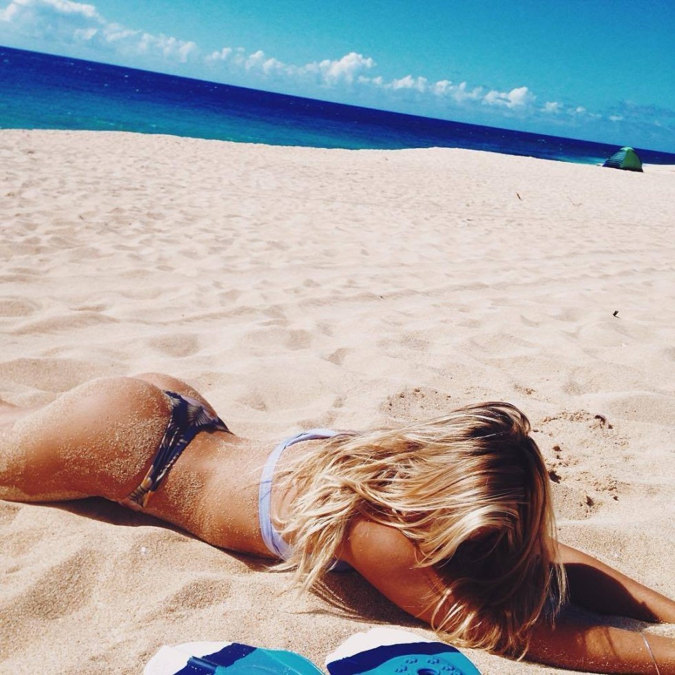Blonde in a swimsuit at sea