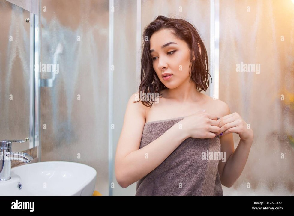 Girl in a dressing gown after the bathroom