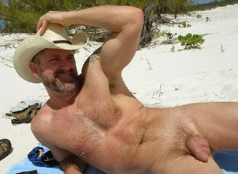 Naked hairy men on the beach