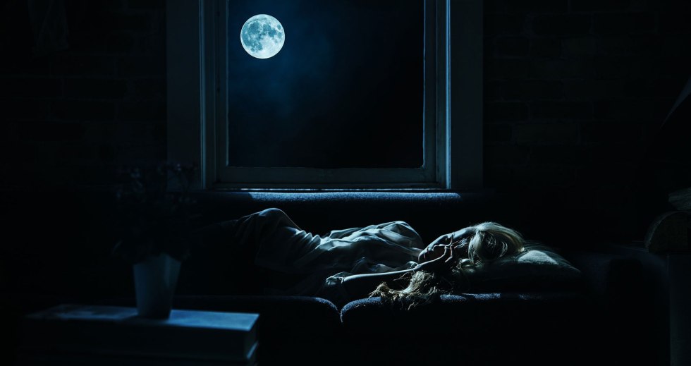 Woman lies on her back