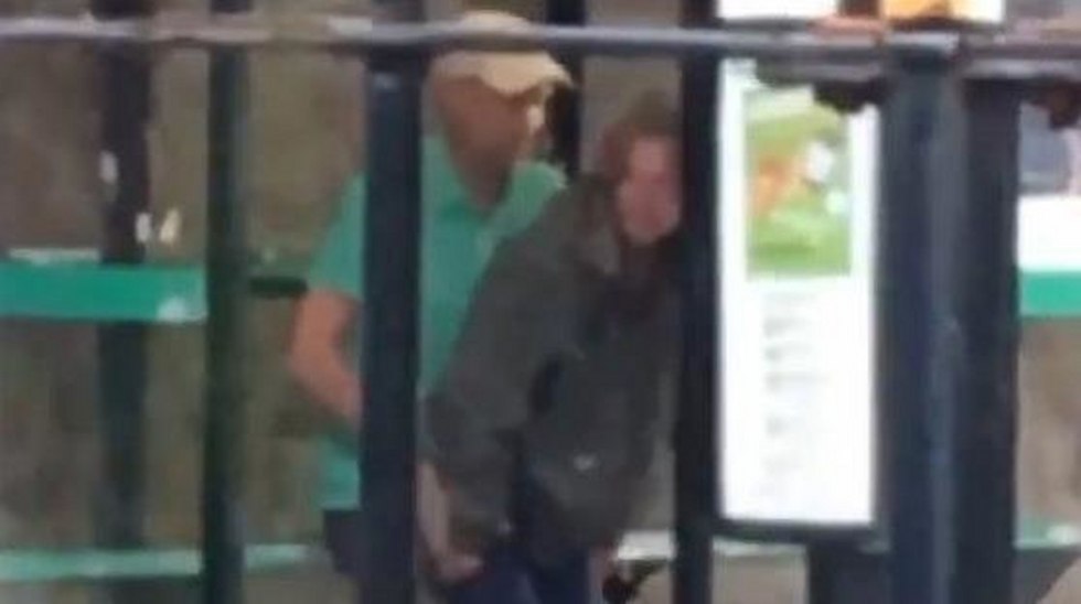 Bus stop with people