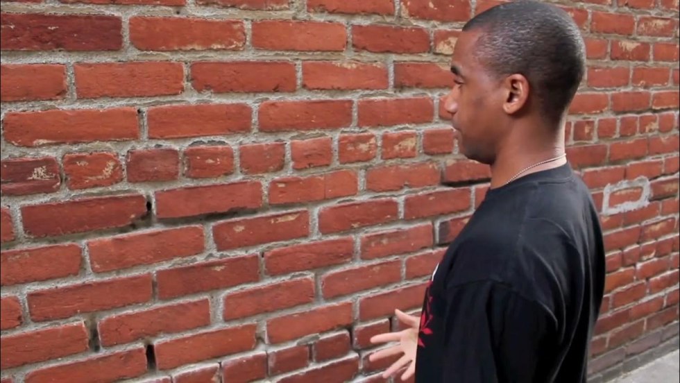 Naked man with a cup of coffee