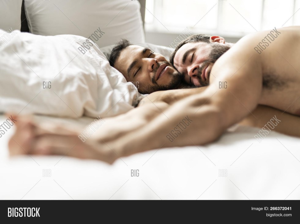 Two men in bed
