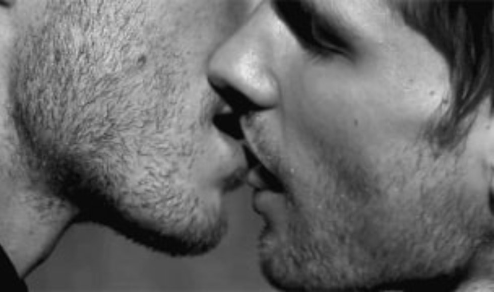 Men kiss