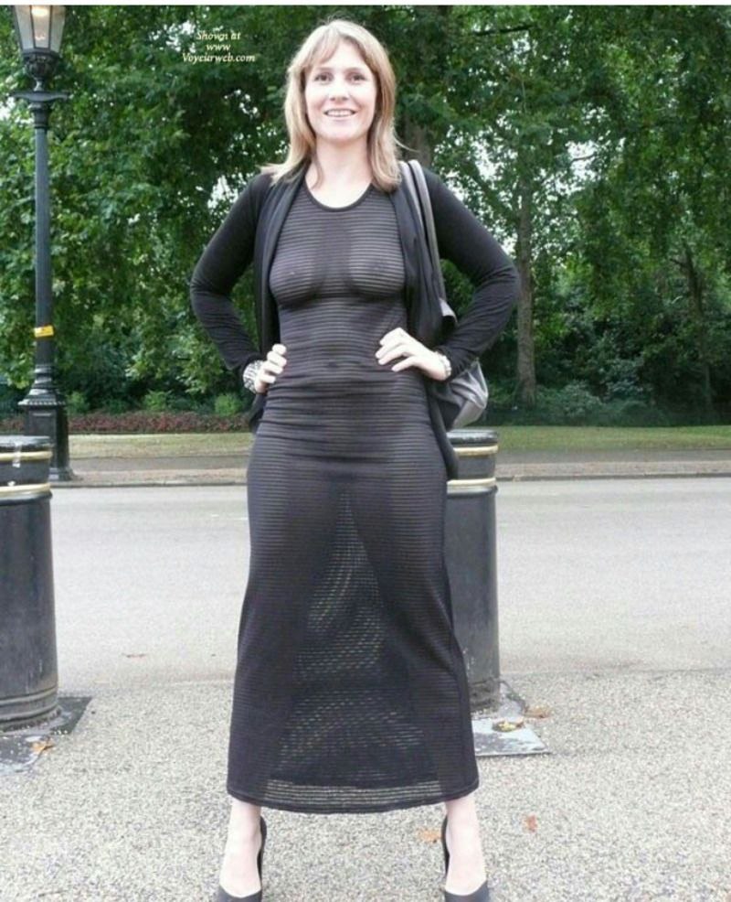 Mature in a transparent dress