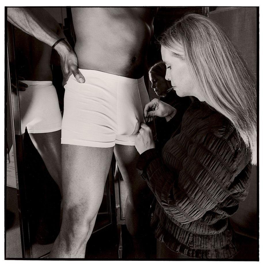 A man touches a woman